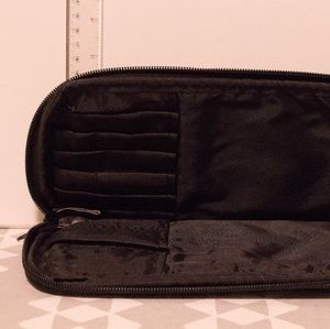Faux leather makeup brush holder.